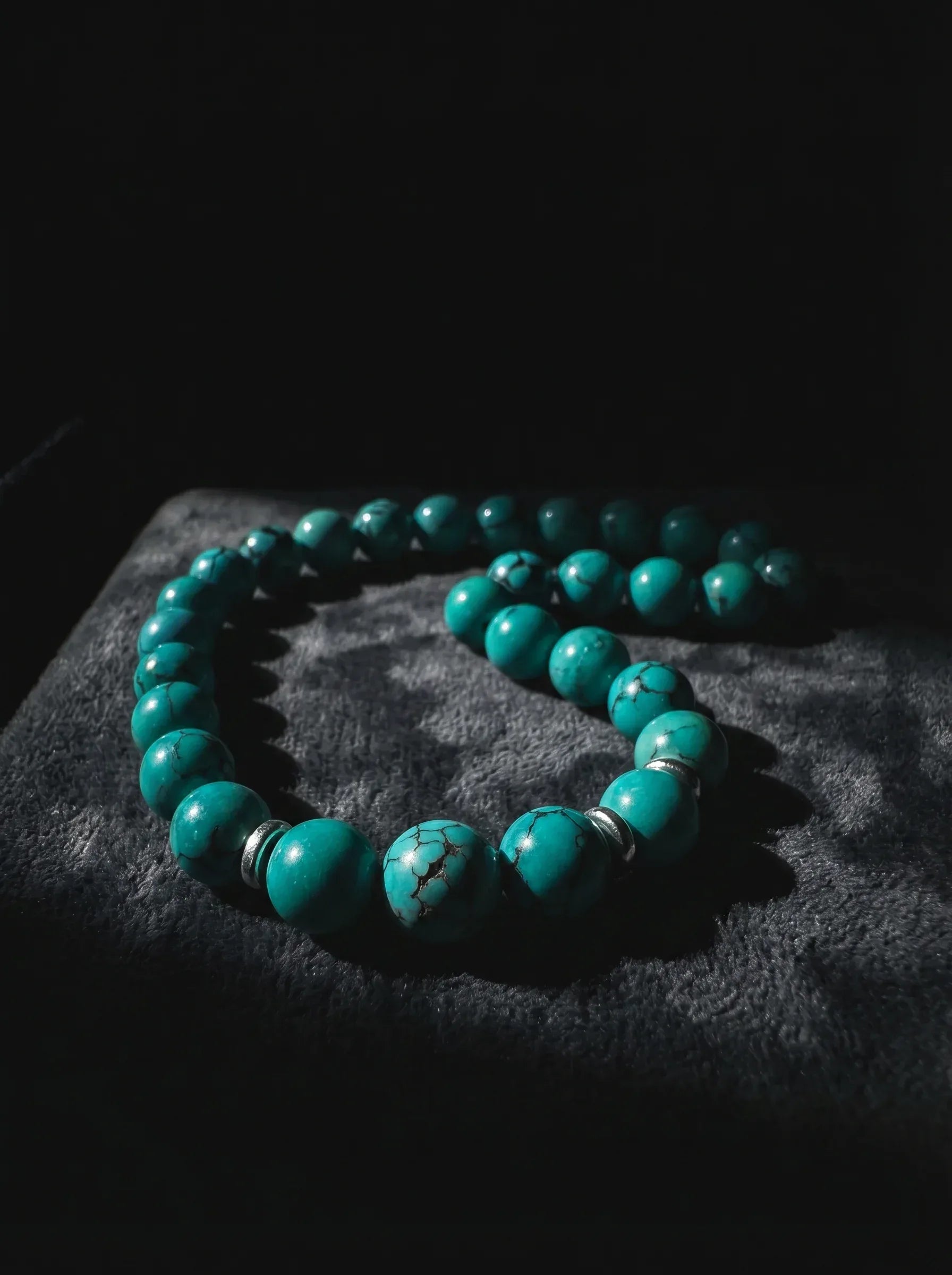 Handcrafted untreated Tibetan turquoise beaded gemstone bracelet for men and women by OresGreen, displaying genuine matrix veins and unoptimized mineral texture on a dark background for zen healing.