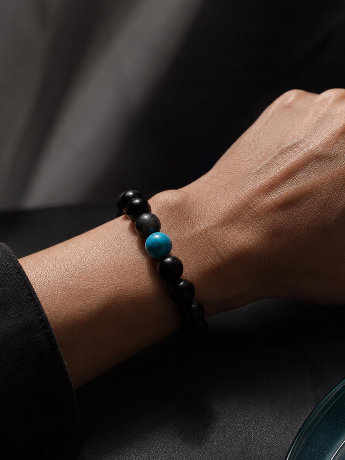 Simple shot of OresGreen Focus Bracelet on wrist, elegant black obsidian bracelet for everyday wear. Its timeless design ensures it stays a staple in your jewelry collection for years.