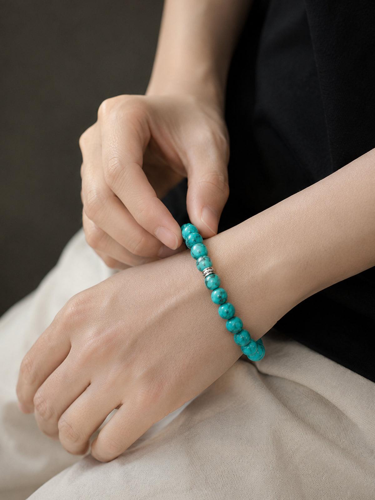 Simple shot of OresGreen Stillness Bracelet on wrist, elegant turquoise jewelry for everyday wear. Its timeless design ensures it stays a staple in your jewelry collection for years.